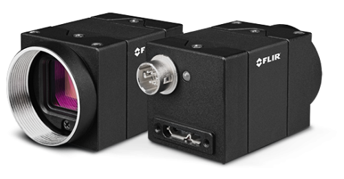 The FLIR Blackfly S USB3 compact camera in front and back view. The lens has a pink color. The back of the camera has a USB3 connector.